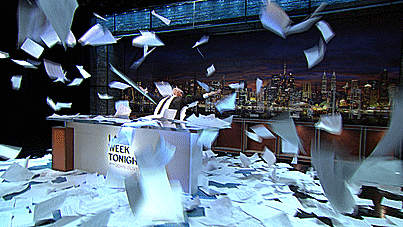 John Oliver Getting Covered in Paper