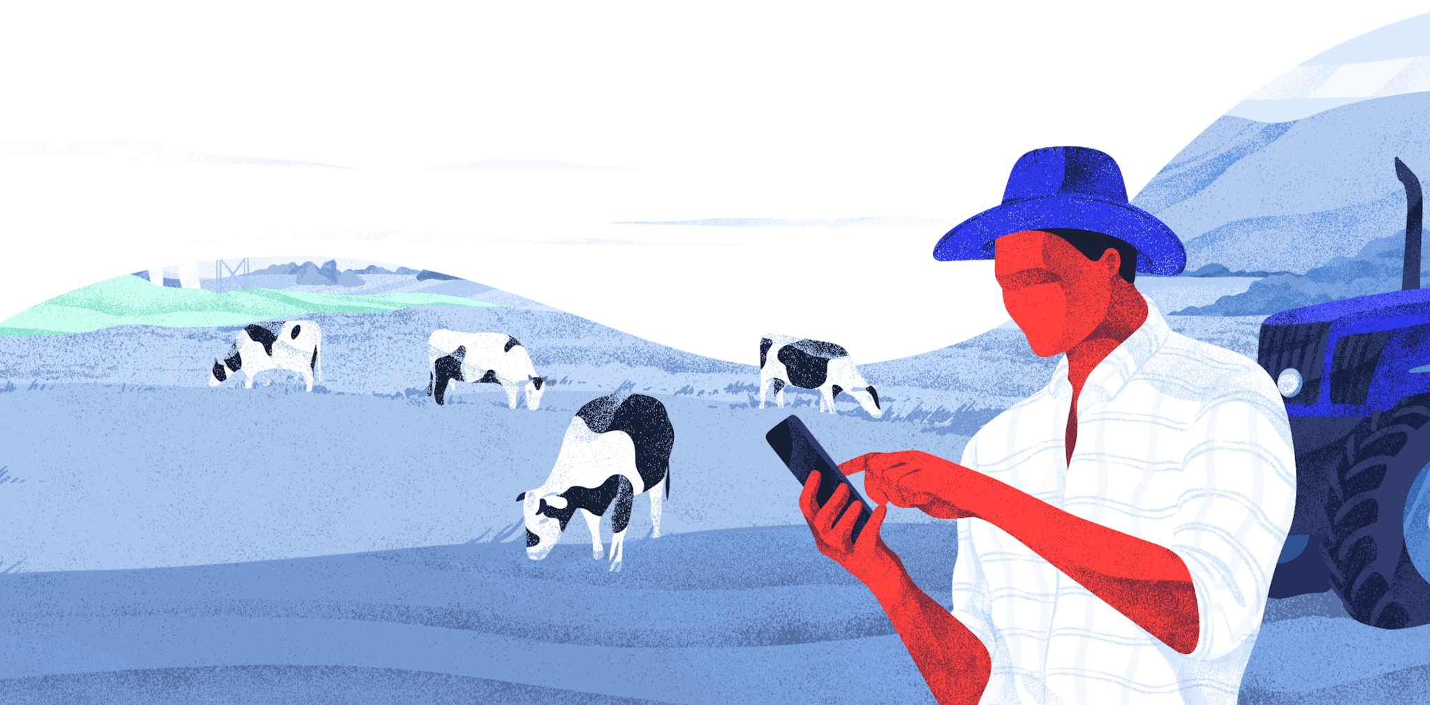 Farmer with phone with cattle in background